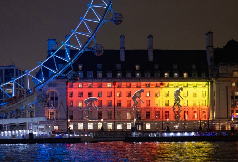 EDITORIAL USE ONLY The story of human evolution from the stone age to the information age appears on the County Hall as part of a light display on London's Southbank to mark the launch of Samsung Galaxy S25 series. Issue date: Thursday January 23, 2025. PA Photo. The spectacle, combining projection mapping and hologauze technologies for the very first time marks a new chapter in Galaxy AI technology, introducing the next evolution of mobile AI experiences. Photo credit should read: Matt Alexander/PA Media Assignments